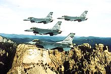 175th Fighter Squadron - 4 F-16 Formation over Mount Rushmore.jpg