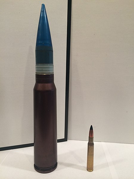 30x173mm round next to a .30-06 Springfield for comparison