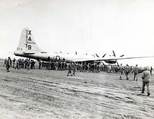 4 March 1945: Dinah Might was the first B-29 to make an emergency landing on Iwo Jima. Greeted by a thousand Marines and Seebees, she was repaired, refueled and flown out of South Field while the fighting was still going on. 9th Bombardment Group Martin-Omaha B-29-25-MO Superfortress 42-65286.jpg