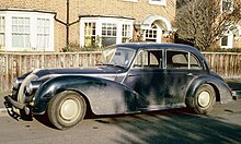 A.C. 2-Litre 1947-1956. The four-door configuration and the wider 6.75 x 16 inch wheels identify this as a later example. The flashing indicators will have been retro-fitted. AC-2litre ca1955 UK.JPG