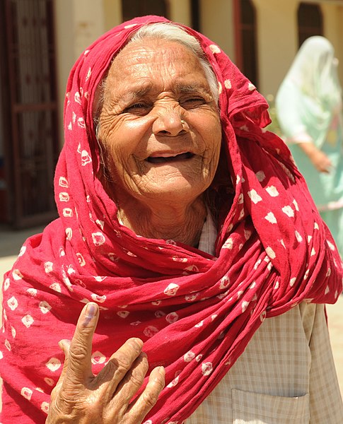 File:An old woman voter showing mark of indelible ink after casting her vote, at a polling booth during the 3rd Phase of Lok Sabha General Elections-2014, in Sonipat, Haryana on April 10, 2014.jpg