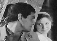 Hamama and Omar Sharif in a scene from the 1957 film Ard al-Salam