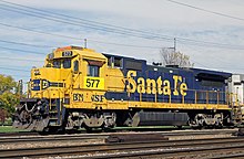 BNSF B40-8 no. 577 at Havelock, Nebraska, in October 2014. As of 2015, this is the only active Dash 8 in ATSF blue and yellow paint on the BNSF system. BNSF 577 Lincoln, NE 10-19-14.jpg