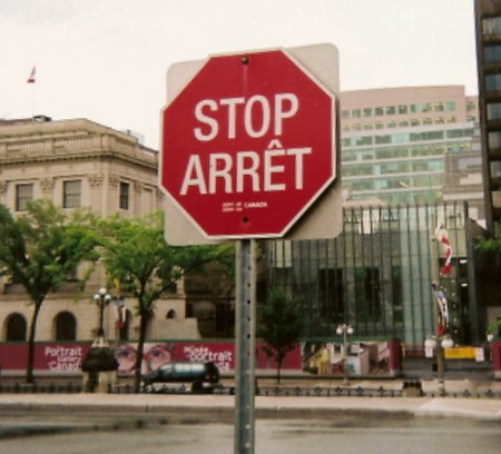 Bilingual (English/French) stop sign on Parliament Hill in Ottawa