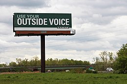 Billboards are a commonly cited example of attention theft. Billboard in Menands, New York.jpg