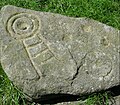 Facsimile cup and ring stone at Bracken Hall.