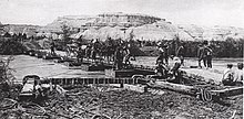 The pontoon bridge across the Jordan Bridge across Jordan River at Ghoraniyeh.jpeg