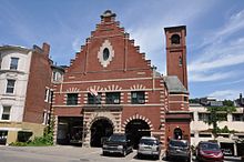 Fire Station No. 7 (Brookline, Massachusetts) (1898), with stepped gable and a rear hose tower BrooklineMA FireStationNumberSeven.jpg