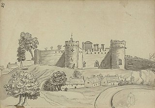 Castle wall with houses below