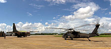 A Royal Thai Air Force G.222 during an emergency evacuation exercise at COBRA GOLD '01, with a US Army UH-60Q Black Hawk helicopter DF-SD-03-02182.JPEG