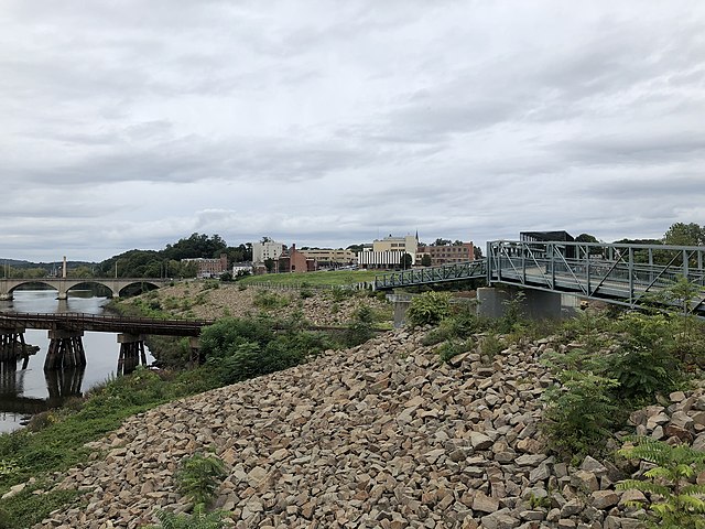 Derby Greenway along the flood wall with the pedestrian crossing over the CSX rail line to the right