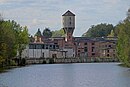 Papierfabrik Wolfswinkel, bestehend aus Wasserturm, Papiermaschinenhalle der Siemens-Schuckert-Werke, Lager- und Produktionsgebäude, Produktionsgebäude und Produktionsanlage „Handgeschöpftes Büttenpapier“, Villenanlage mit Fabrikantenvilla, Nebengebäude, Einfriedung und Park, Maschinenhaus, Tischlerei, Kesselhaus, Kläranlage und Wasserwerk, Werkstattgebäude, Wehr, Pförtnerhaus mit Nebengebäude und Resten der Hofpflasterung