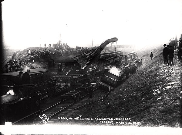 The clean-up begins after the Felling derailment in 1907, which cost two lives and saw eight more seriously injured.