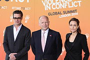 Foreign Secretary William Hague with UN Special Envoy Angelina Jolie and Brad Pitt at the beginning of day three of the Global Summit to End Sexual Violence in Conflict (12 June 2014)