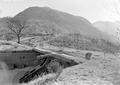 Geschütz der Südbatterie Monte Ceneri, Hintergrund: Cima di Medeglia, Alpe di Grumo/Grun, Infanteriestützpunkte 1, 2 und 3