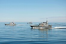 HMS Explorer in formation with HMS Biter, Pursuer, and Trumpeter on a summer deployment in the Baltic Sea, 2015 (Photo taken from HMS Trumpeter). HMS Explorer Biter Pursuer Baltic.jpg