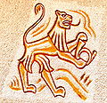 Lion with post horn, sgraffito on the east wall of the garage on the Kohldorfer Street #39 in Sankt Martin, Klagenfurt