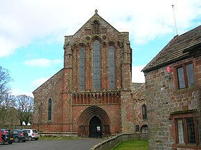 West front of Lanercost Priory, with the statue of Mary Magdalene at top Lanercost Priory, West Front, Cumbria.JPG