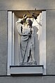 Figur Johannes des Täufers an der Fassade