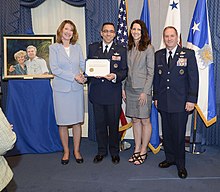Under Secretary Lisa Disbrow and Vice Chief of Staff Gen David L. Goldfein present the 2015 General and Mrs. Jerome F. O'Malley Award to Col. William Liquori Jr. and his wife Amy during a ceremony in the Pentagon, May 3, 2016. Leaving a legacy, beginning a tradition (3).jpg