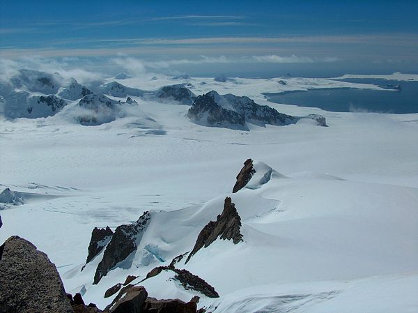 Fieldwork in Levski Ridge. Lower Huron Glacier from Ongal Peak, with eastern Bowles Ridge, Varna Peninsula and Drake Passage in the background