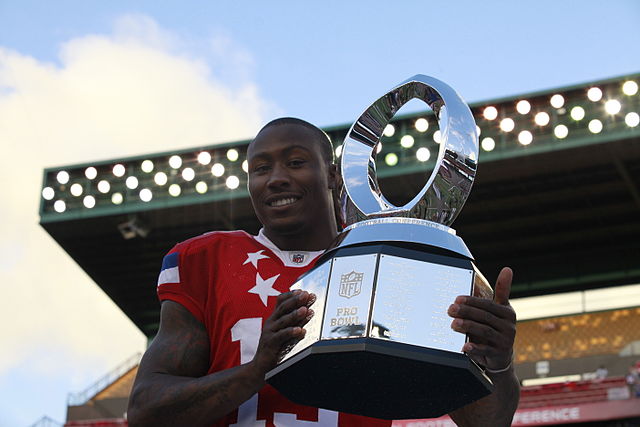 Marshall with the 2012 Pro Bowl MVP trophy.