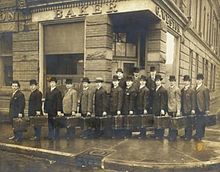 Model Bakery "biscuit travellers" or salesmen, Soho and Phoebe streets, Toronto, postcard, ca. 1910. Model Bakery biscuit travellers Toronto ca 1910.jpg