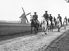 Photograph of the commander of the Scots Greys and his staff riding near Brimeux on 25 May 1918. While they were in reserve, the horses were obviously allowed their natural colour. Royal Scots Greys (France WWI) CO and Staff.jpg