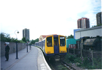 Class 313 at North Woolwich in 2001, closed in 2006. North Woolich (closed) station Mk1.png