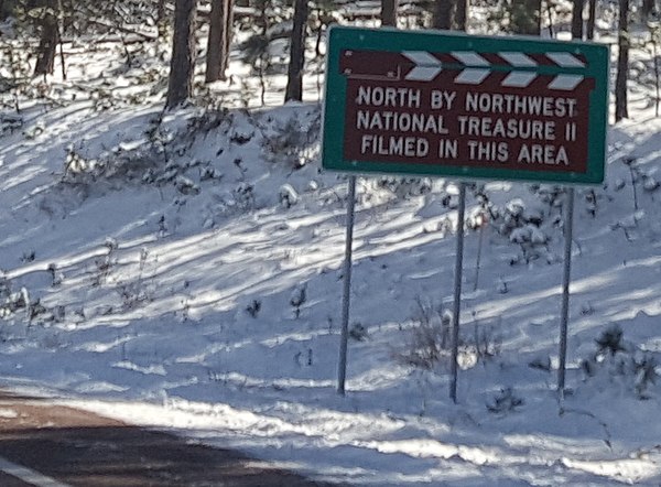 A sign on the road approaching Mount Rushmore