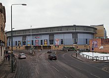 The arena, under 2011-15 signage, viewed from Southwell Road (2013) Nottingham, NG3 - Southwell Road (geograph 3308373).jpg