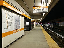 The platform at Oak Grove station, the line's northern terminus Oak Grove MBTA station at night 2.jpg