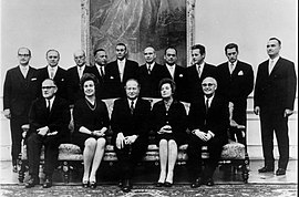 Cabinet Kreisky I, with Chancellor Bruno Kreisky seated at the center of the futon and President Rudolf Kirchschlager standing behind him (center-right) Oesterreichische Bundesregierung - Kabinett Kreisky I.jpg