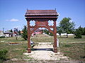 Székely gate in the Millenary Memorial Park in Pápa, Hungary, presented by twin town Kovászna (Covasna, Romania). Székelykapu a pápai Millenniumi Emlékparkban, a testvérváros Kovászna ajándéka.