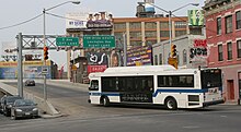 A non-articulated Bx15 entering the Third Avenue Bridge towards upper Manhattan. This was taken in 2007, before the Bx15's transfer from West Farms Depot to Kingsbridge Depot. Portmorris1.JPG