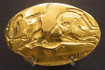 Bull-leaping on a gold signet ring