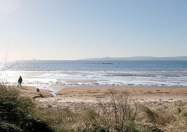 The Seamill beach looks south down the outer firth towards southern Arran and Ailsa Craig