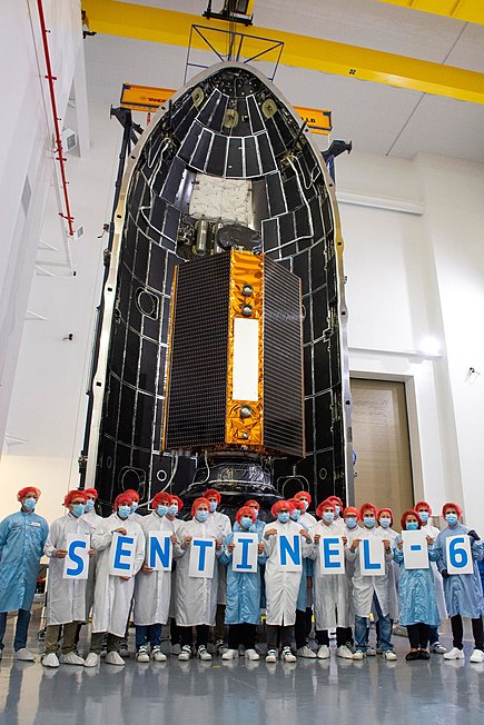 Inside SpaceX's Payload Processing Facility at Vandenberg Air Force Base in California, the U.S.-European Sentinel-6 Michael Freilich ocean-monitoring satellite is being encapsulated in the SpaceX Falcon 9 payload fairing on 3 November 2020. (NASA) Sentinel-6.jpg