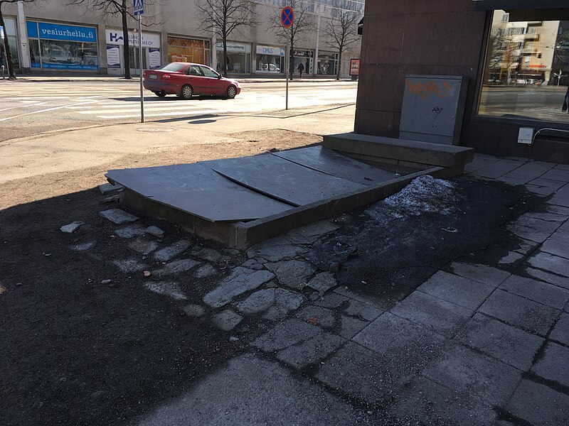 File:Snow and damaged sidewalk panel (43235663124).jpg