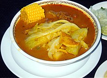 Sopa de pata is a popular soup in El Salvador made from cow tripe, plantain, corn, tomatoes, cabbage and spices. Sopa de pata.jpg