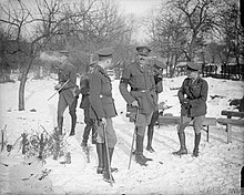 Prince Edward,the Prince of Wales and Major-General Tom Bridges,GOC of the 19th (Western) Division (in centre,facing camera),after inspection of the 8th (Service) Battalion,North Staffordshire Regiment near Beaussart,1 February 1917. The Royal Visits on the Western Front,1914-1918 Q4767.jpg