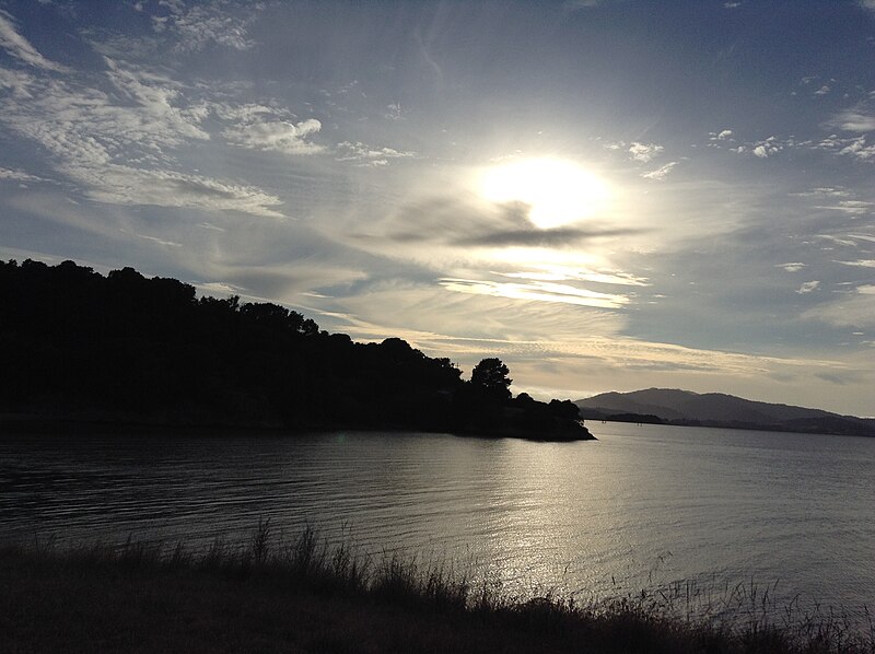 File:The sun shines through the clouds at China Camp.jpg