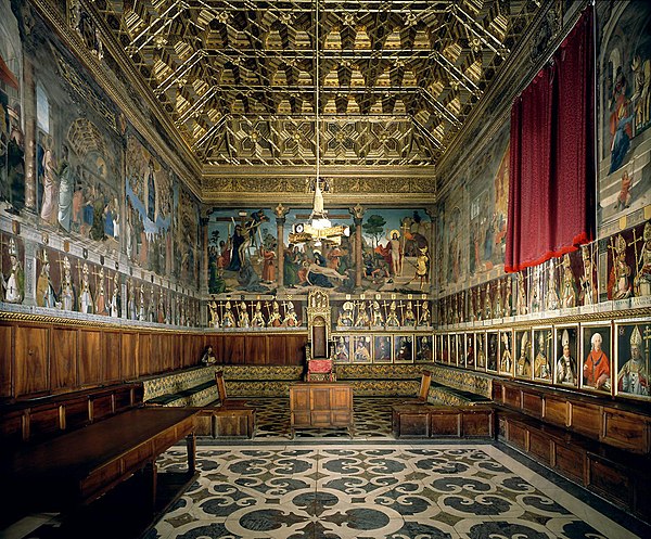 Late Renaissance grandeur at Toledo Cathedral, with wooden coffered ceiling