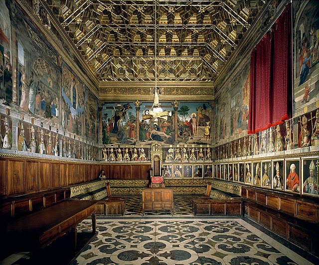 Late Renaissance grandeur at Toledo Cathedral, with wooden coffered ceiling