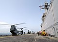 US Navy 040724-N-6380E-045 The flight deck crew aboard the amphibious assault ship USS Wasp (LHD 1) welcomes back CH-46 Sea Knights helicopter assigned to the Fighting Griffins.jpg