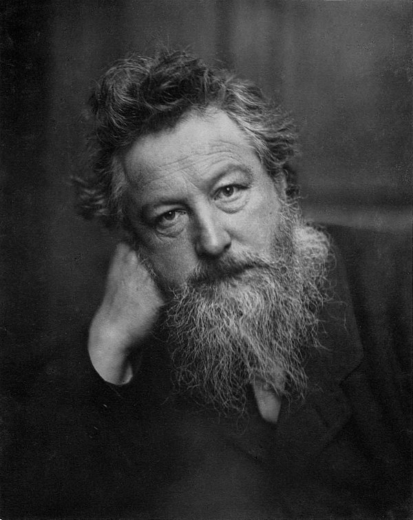 William Morris, a textile designer who was a key influence on the Arts and Crafts movement