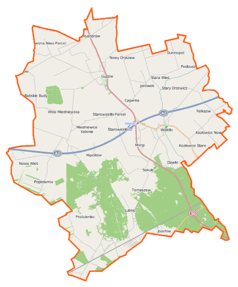 Mapa konturowa gminy Wiskitki, blisko centrum na prawo znajduje się punkt z opisem „Wiskitki”