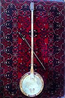Yaylı tambur a variation of Turkish tambur, metal and uses a bow