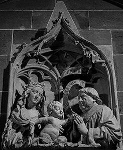 Canon Conrad de Bussnang praying to Virgin and Child. (15th c.)