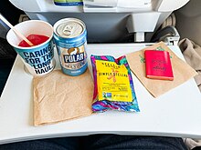 An in-flight snack on a tray table